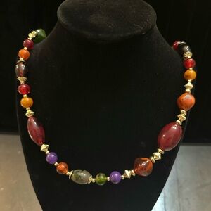 Multi colored beaded necklace about 30 inches long